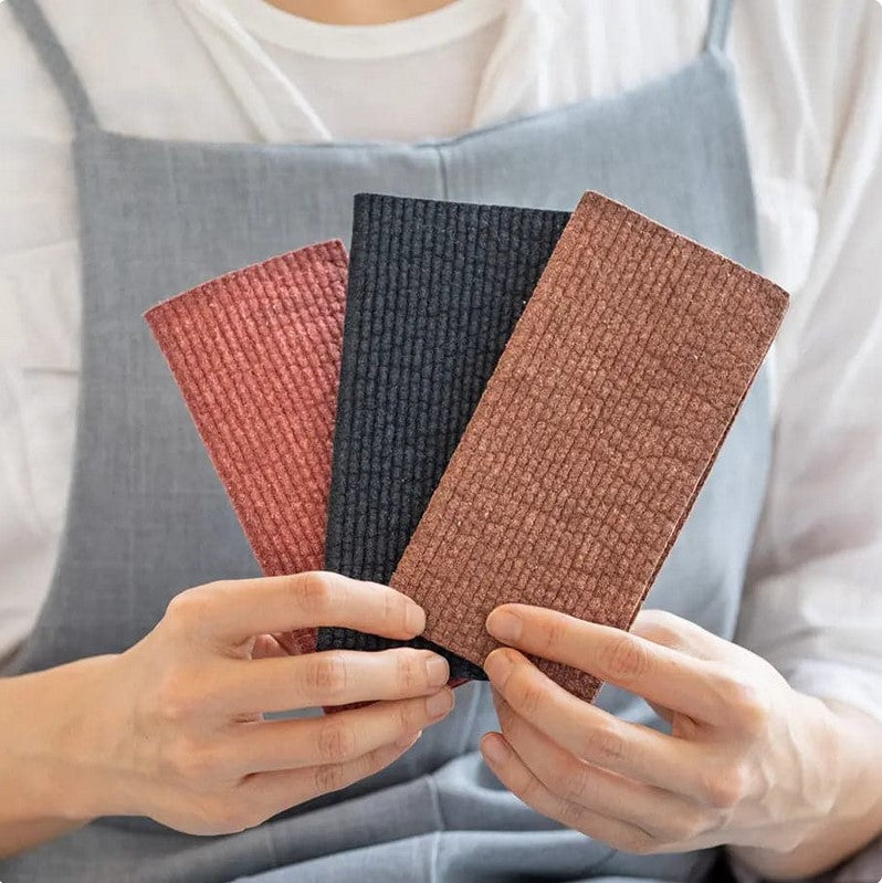 Close-up of the Swedish cloth's vibrant floral pattern and textured weave showcasing intricate design details.