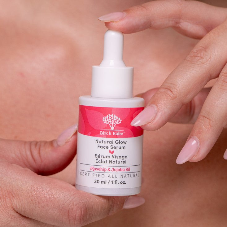 Birch Babe Natural Glow Face Serum in glass bottle with dropper, lightweight, hydrating formula, subtle botanical scent