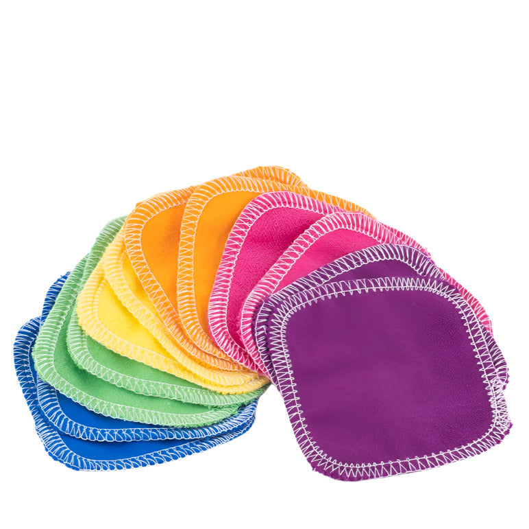 Close-up of rainbow-colored fabric texture on the reusable facial rounds, highlighting the soft, plush surface and vibrant