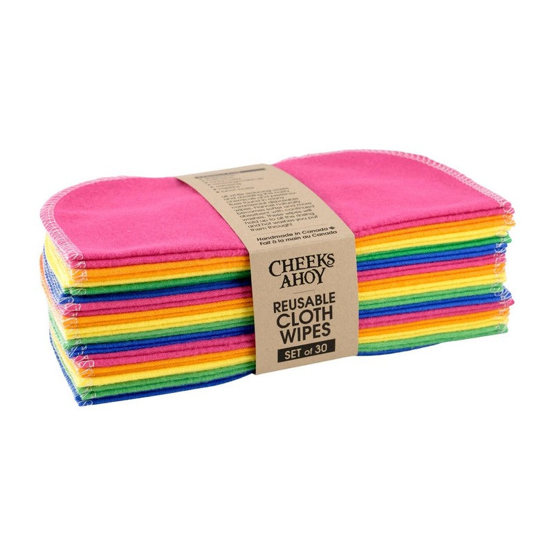 Close-up of rainbow-colored cloth wipe's textured, soft bamboo fiber surface with neatly stitched edges and vibrant hue