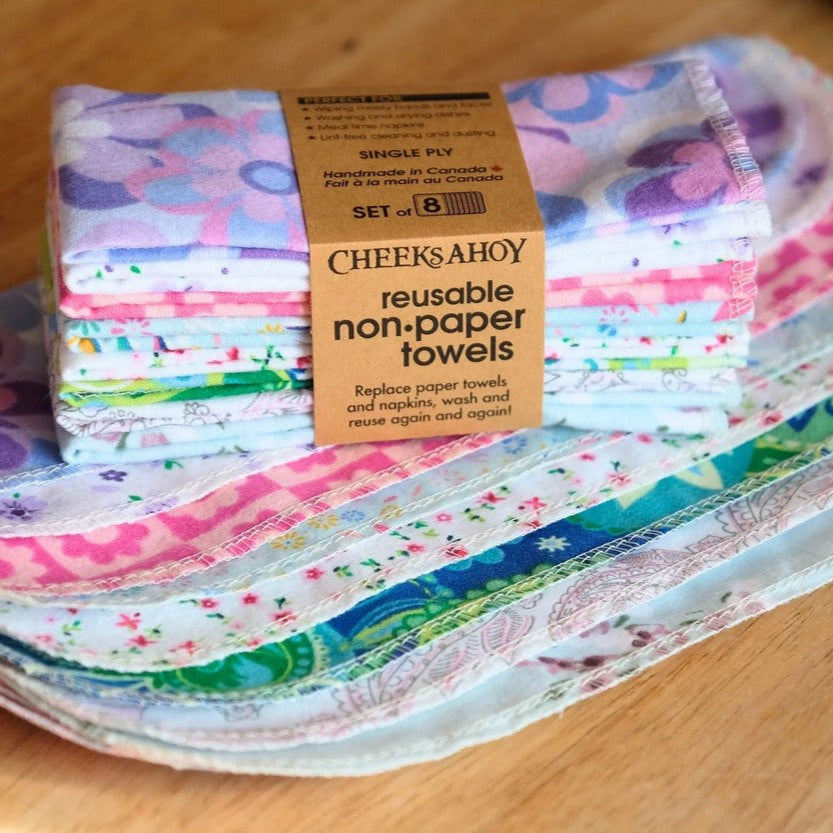 Close-up of spring floral pattern on reusable non-paper towels, highlighting vibrant color detail and fabric texture.