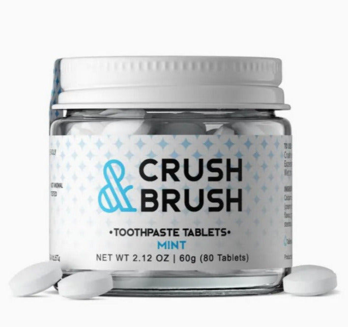 Nelson Naturals Crush & Brush Mint Toothpaste Tablets in reusable glass jar with white tablets and green label, plastic-free