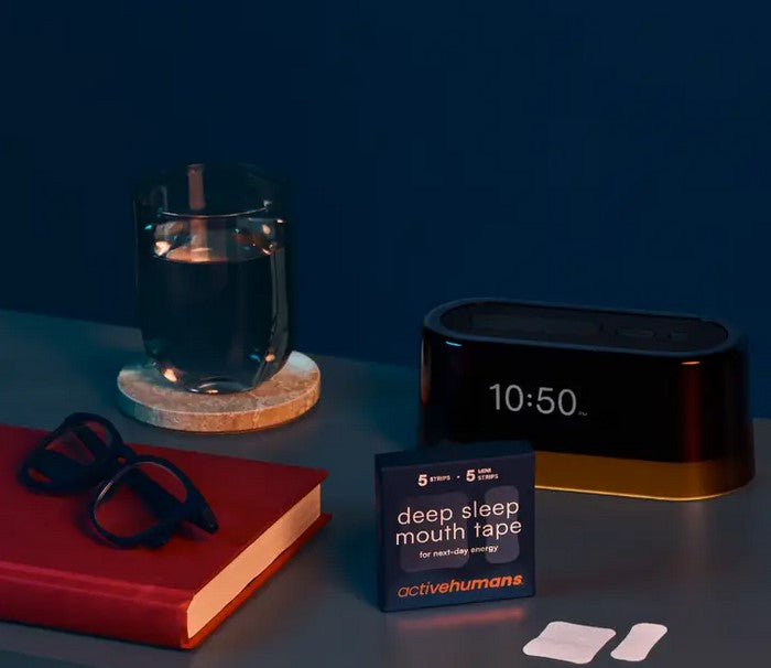 Close-up of the Deep Sleep Mouth Tape’s textured surface and breathable adhesive detail on transparent packaging.