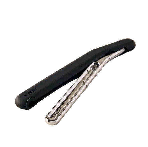 Protect your Leaf Dermaplaner with a black durable silicone cover shown on a stainless steel razor on a white background.