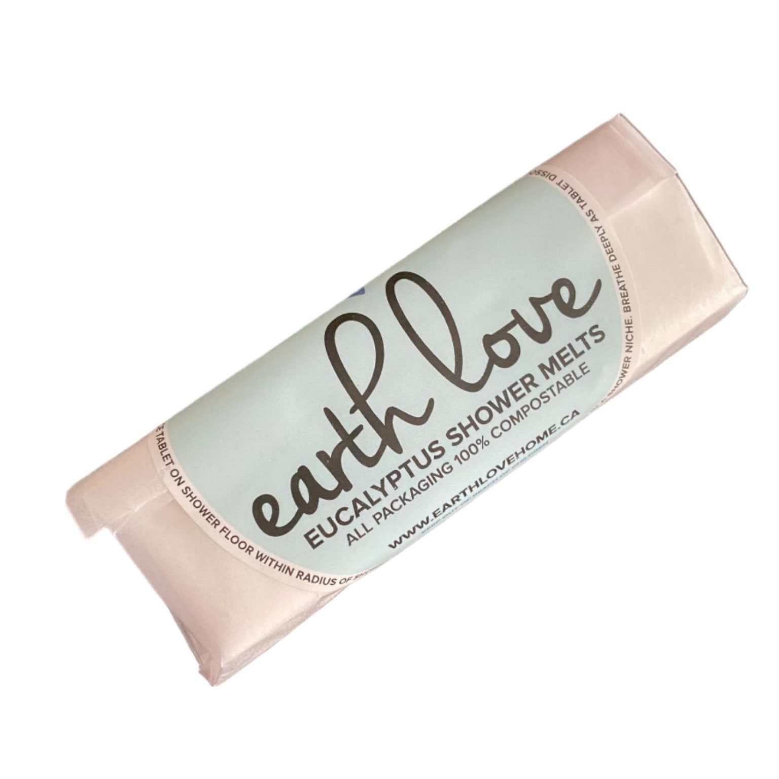 Close-up of Earth Love Eucalyptus Shower Melts with visible textured surface and natural mottled green and white colors