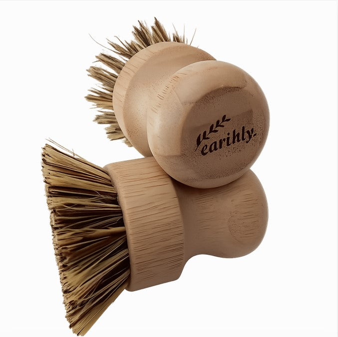 Two Earthly Compostable Pot Scrubbers with natural sisal bristles and bamboo handle for plastic-free kitchen cleaning shown on a white background