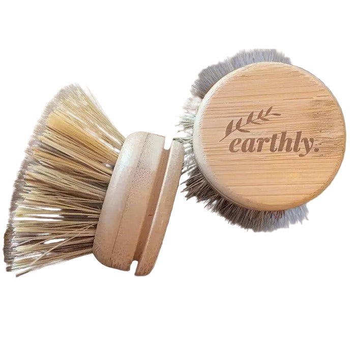 Close-up of the textured bristle tips showcasing the compostable material and natural wood handle at a slight upward angle