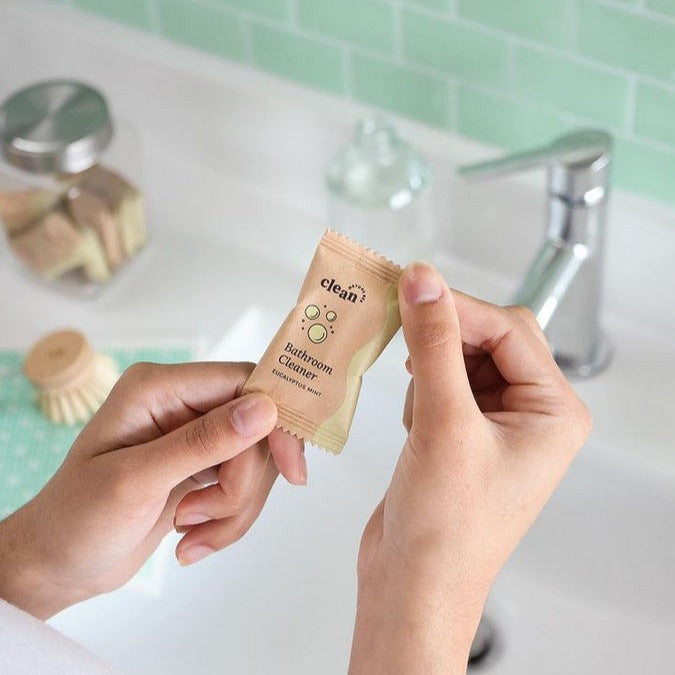 Close-up of the Nature Bee Bathroom Spray Cleaner Kit label highlighting eco-friendly ingredients and natural bee icon