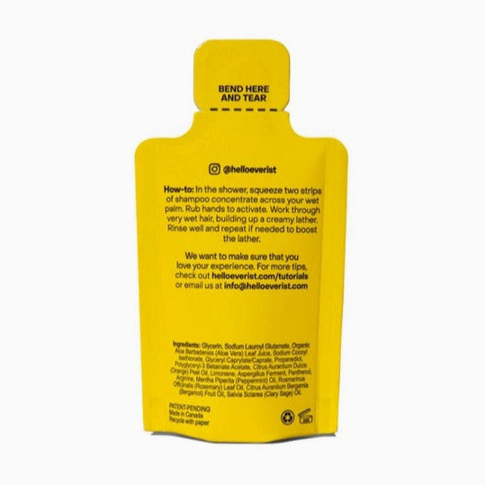 Close-up of the Everist Shampoo Concentrate sample label highlighting ingredient details and scent notes on the minimalistic