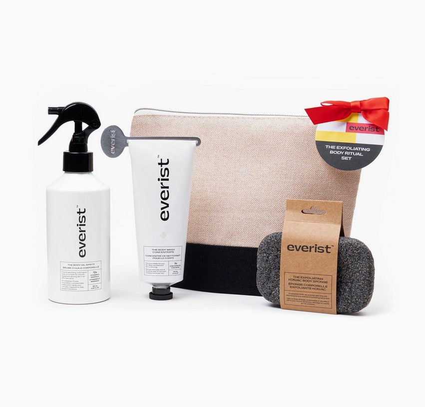 Everist Limited Edition Exfoliating Body Ritual Set with natural scrub, hydrating lotion, and exfoliating mitt in white and