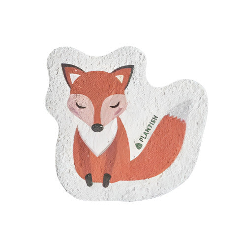 Plantish Fox Pop Up Sponge made of cellulose, orange-colored fox shape with textured surface, compact size for kitchen