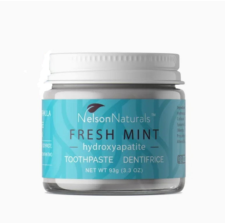 Nelson Naturals Fresh Mint Toothpaste in a clear glass jar with white lid, 4 oz, featuring a textured label with green mint