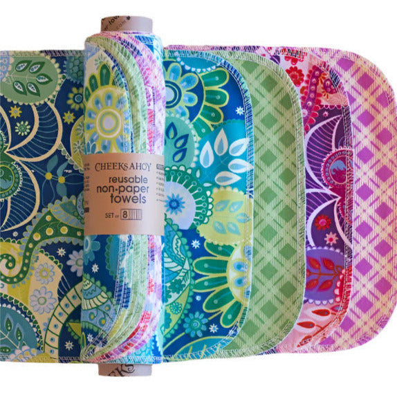 Cheeks Ahoy reusable non-paper towels featuring colorful pink, blue, and yellow floral patterns on textured cotton fabric