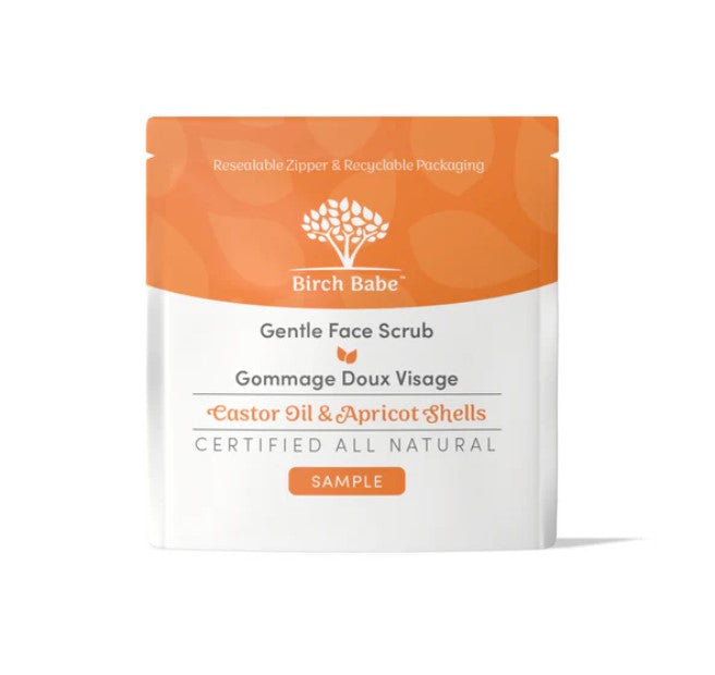 Close-up of the Gentle Face Scrub’s textured surface with visible natural exfoliants and a light citrus scent on the