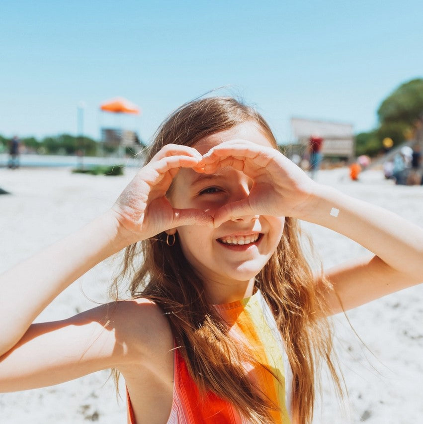 Close-up of NATPAT UV Sensing Sticker’s textured surface and vibrant green color, highlighting its thin, flexible material