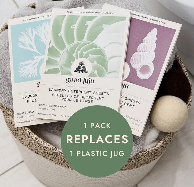 Close-up of the unscented laundry detergent sheets displaying textured, white, 3D embossed surface and corner edges on clear