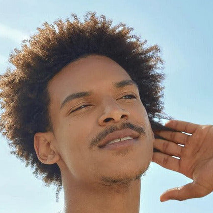 Close-up of the Ciel D'azur Shampoo Bar’s textured surface with visible floral fragrance notes and eco-friendly packaging