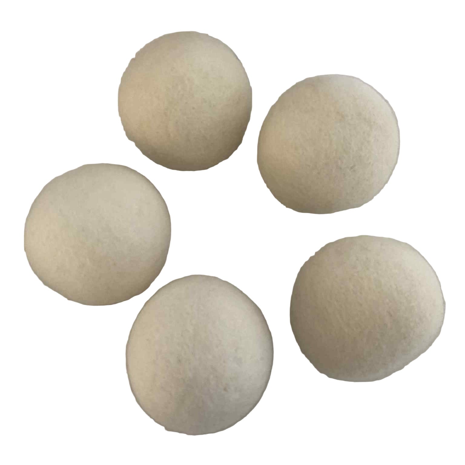 Close-up of Earthly Wool Dryer Balls highlighting their dense, fibrous texture and natural wool fibers for effective drying