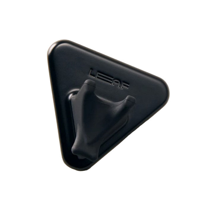 Leaf Razor Shower Holder in matte stainless steel with secure clasp, designed to hold dermaplaner blades and leaf shave