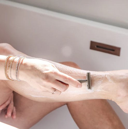 Close-up of the Bergamot Lime Shave Bar’s textured surface with visible natural flecks, highlighting its handcrafted