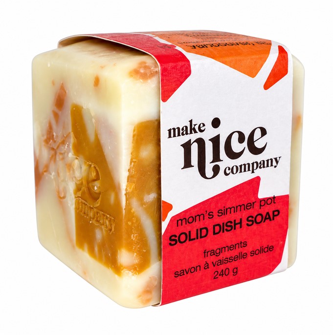 Make Nice Company Mom's Simmering Pot Solid Dish Soap, 240g Canadian-made plastic-free dish soap with marbled orange and cream design and biodegradable label.