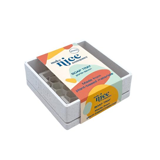 Close-up of the Make Nice Company Dish Soap Tray’s textured, matte-finish surface with curved edges and drainage holes