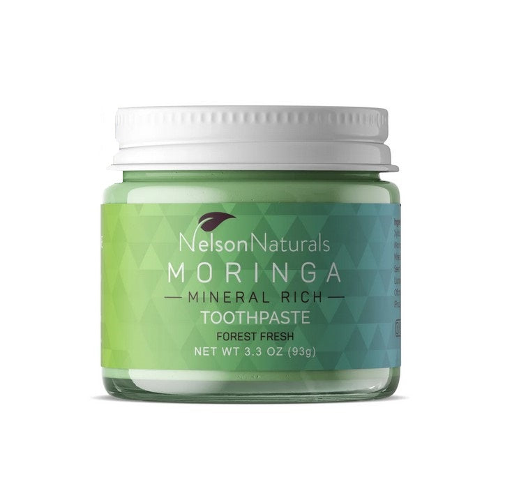 Nelson Naturals Moringa Toothpaste in a glass jar with forest fresh label, plastic-free zero waste dental care product