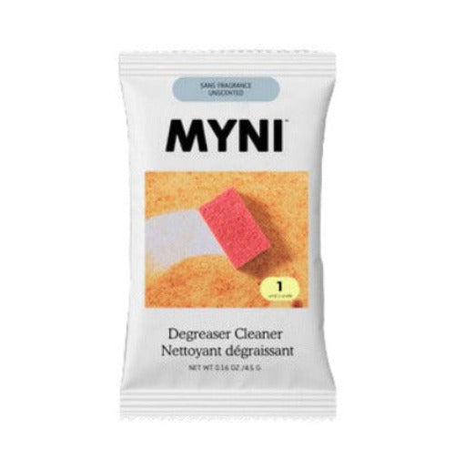 Myni Degreaser Cleaner unscented tablet in compostable packet on white countertop, Canadian zero-waste kitchen cleaning product