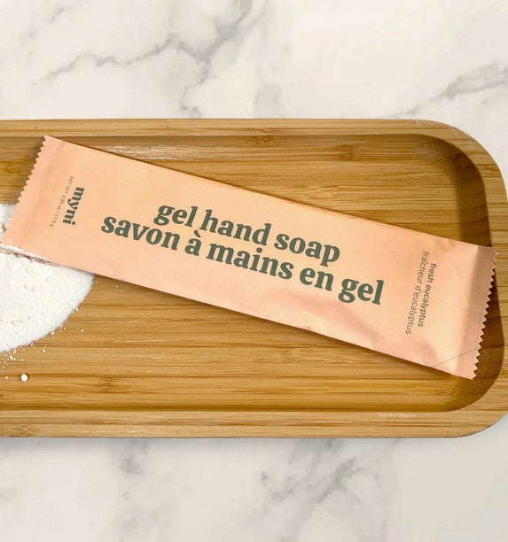 Close-up of Myni Gel Hand Soap refill pouch displaying textured purple powder-to-gel material and clear measuring indicator