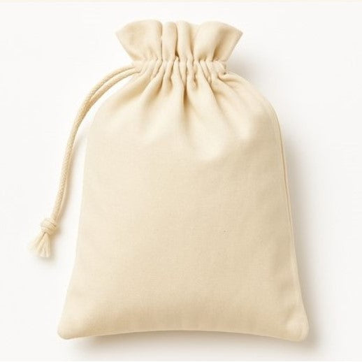 Eco-friendly cotton drawstring bag for mystery gift set, reusable zero-waste packaging for sustainable household and personal care products in Canada