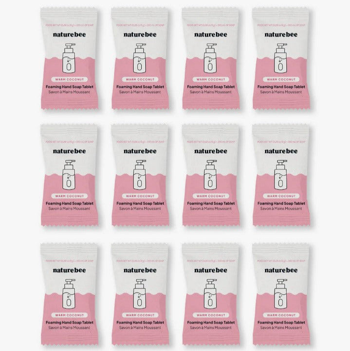 Close-up of the foil wrapping and textured surface of Nature Bee Coconut Soap Tablets with clear branding detail