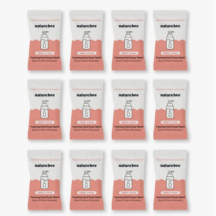 Close-up of the foaming hand soap tablets' textured surface and vibrant citrus scent label on the packaging.