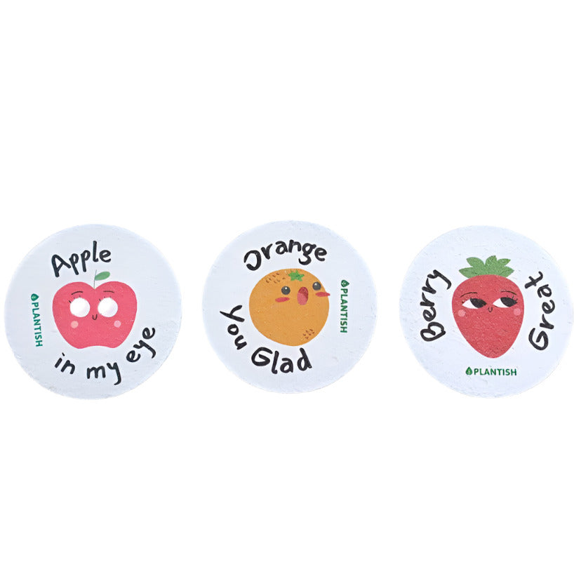 Plantish Pep Talk Pop Up Sponge in vibrant orange with textured cellulose surface, compact size, and colorful fun design for