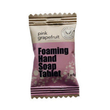Pink grapefruit-scented foaming hand soap tablet by Essence of Life Organics, zero waste, made in Canada