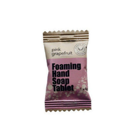 Pink grapefruit-scented foaming hand soap tablet by Essence of Life Organics, zero waste, made in Canada