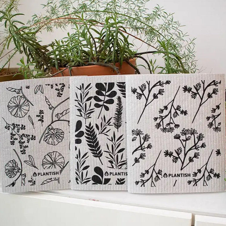 Close-up of vibrant green Swedish sponge cloth texture with visible embossed leaf pattern and crisp woven edges