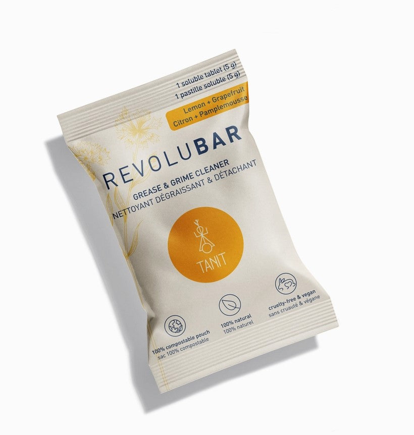 Close-up of the Revolubar cleaner tablet's textured surface and embossed logo for durability and handling grip.