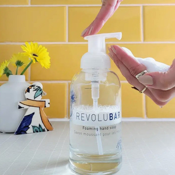 Close-up of the Revolubar Foaming Hand Soap Starter Kit label on the bottle showing ingredients and branding details