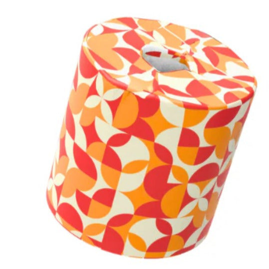 Close-up of colorful bamboo toilet paper wrap showing vibrant striped pattern and textured natural bamboo fibers near edge