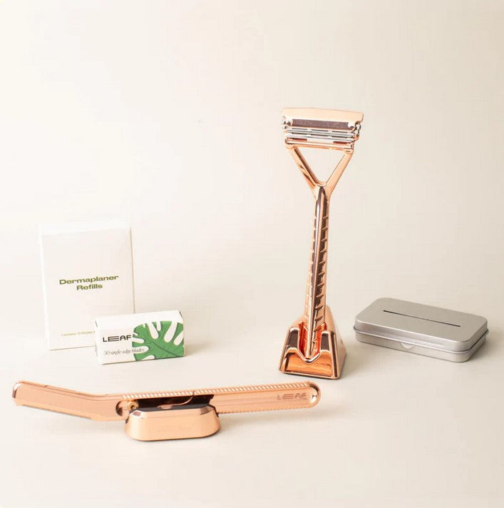 Leaf Rose Gold Face and Body Dermaplaner Set with stainless steel leaf-shaped razor blades and matching rose gold handle