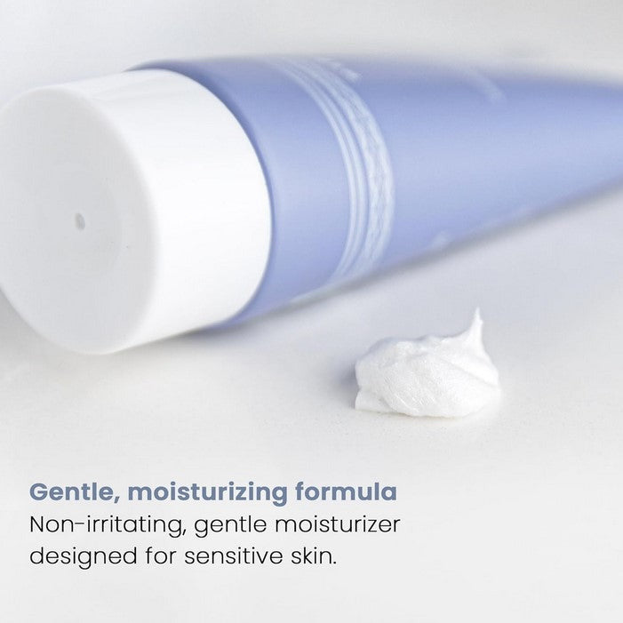 Close-up of Henson Shave Cream tube highlighting textured white formula and fresh citrus scent details