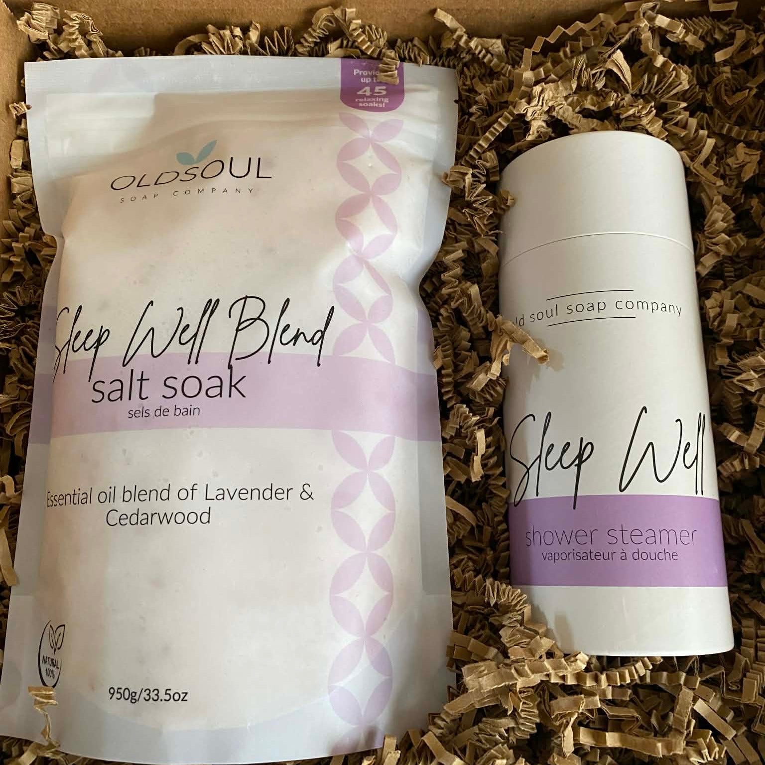 Sleep Well Gift Box featuring Old Soul Soap Company lavender and cedarwood Sleep Well Salt Soak and Sleep Well Shower Steamers nestled in a brown kraft gift box
