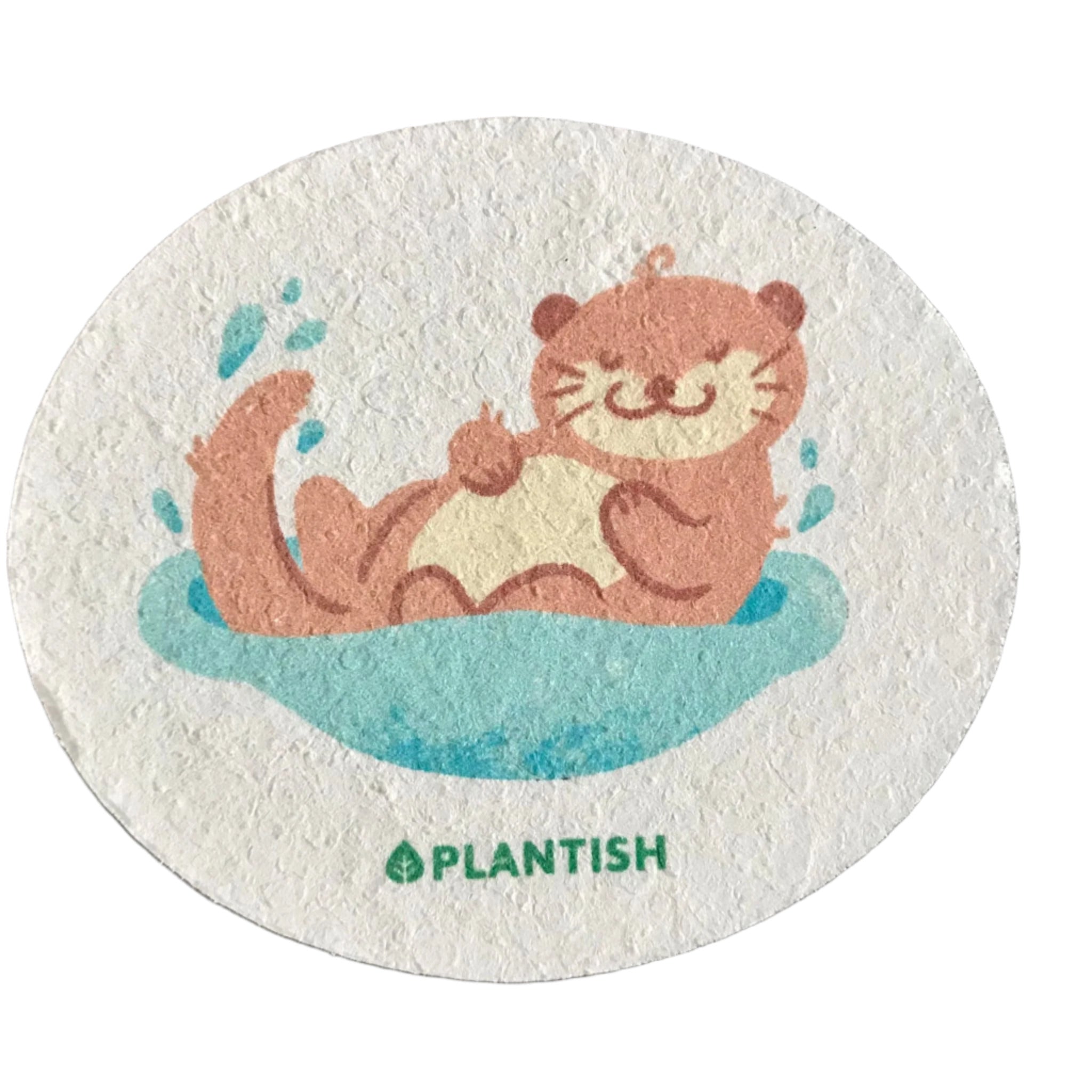 Plantish Sleepy Otter pop-up sponge in soft cellulose material with grey body, orange ears, and textured surface for kitchen