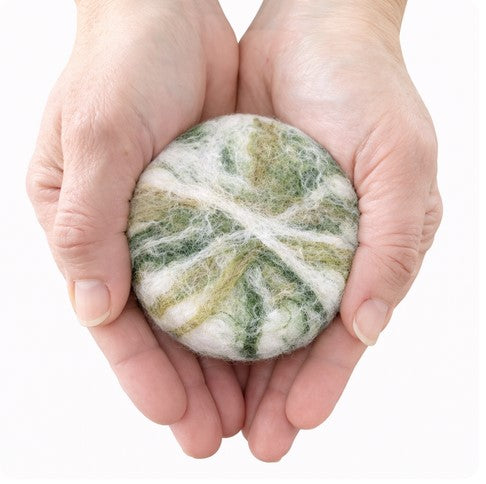 SNC felted 'winter greens' pattern cedar sage soap bar soap in hands 