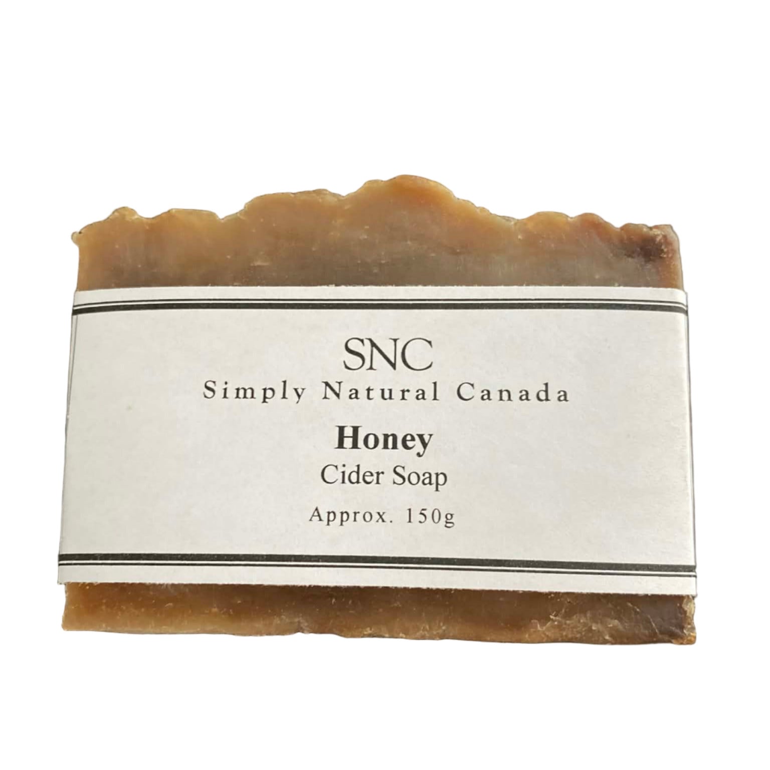 Honey Cider Soap bar by Simply Natural Canada with white label displaying product name, handcrafted natural Canadian soap photographed on a dark surface.