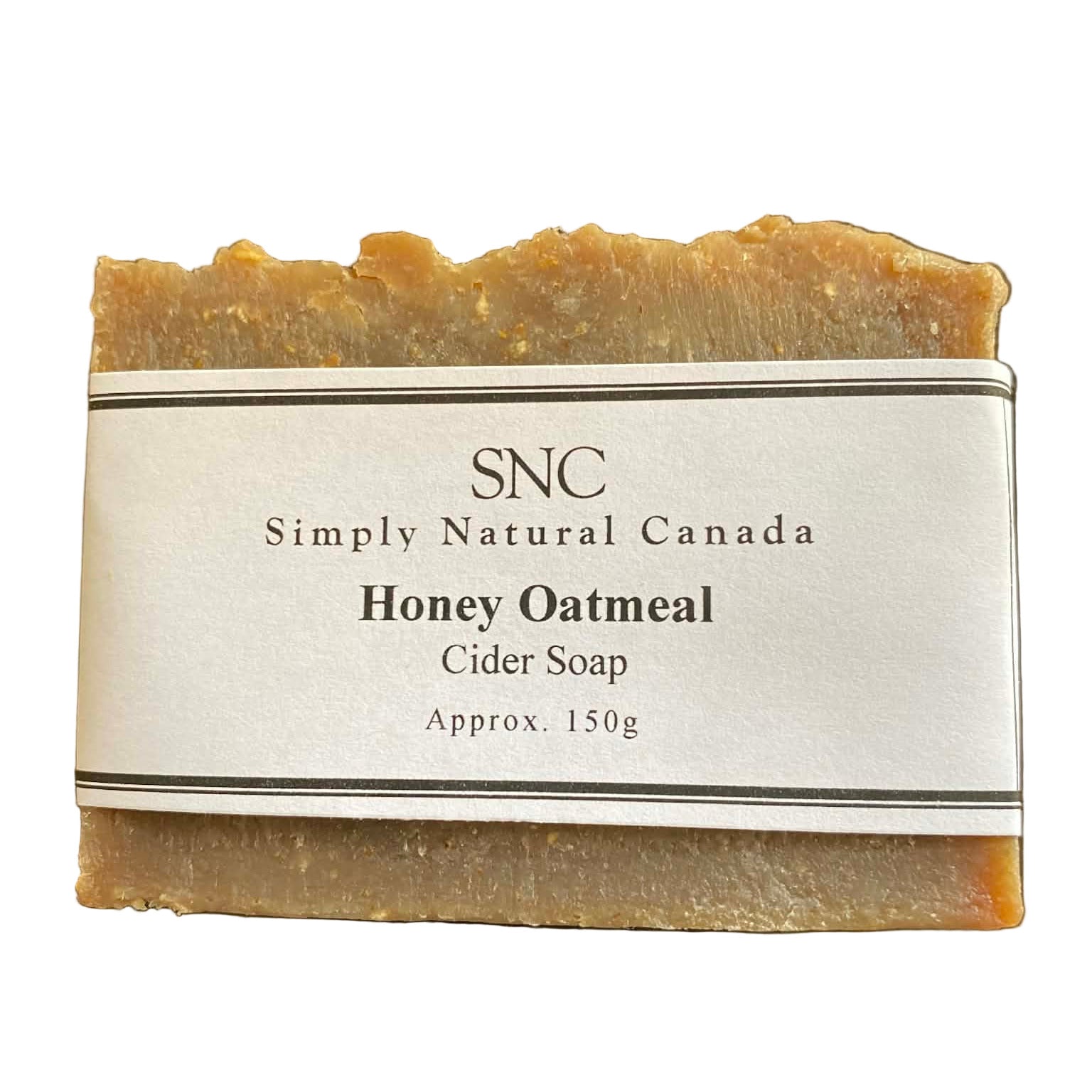 Honey Oatmeal Cider Soap bar by Simply Natural Canada with white label displaying product name, handcrafted natural Canadian soap photographed on a dark surface.