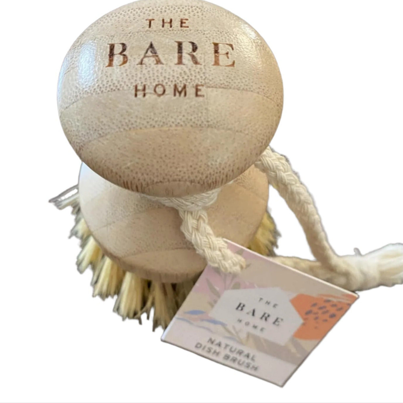 Close-up of natural wooden bristles revealing their coarse texture and handcrafted finish on the pot scrubber.