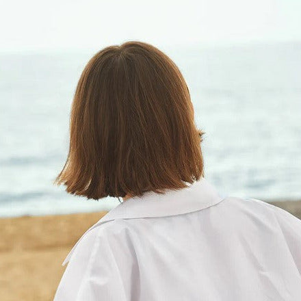 Close-up of Oasis Conditioner Bar label highlighting natural ingredients and fresh citrus scent detail