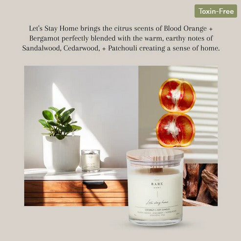 Close-up of the candle’s textured frosted glass jar with subtle ridges and a glimpse of the burn line inside, highlighting