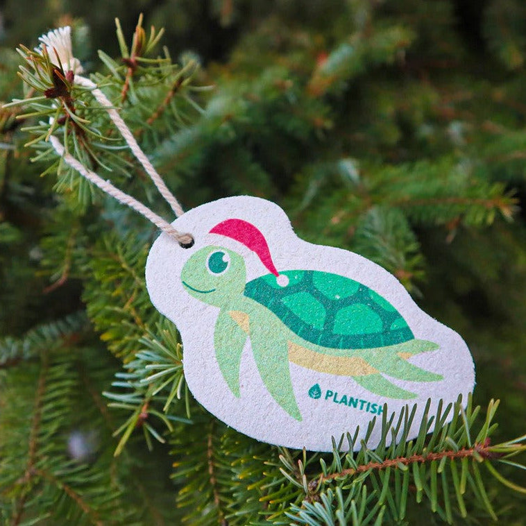 Close-up of the Festive Critter Sponge’s detailed smiling face with textured surface and colorful holiday accents visible